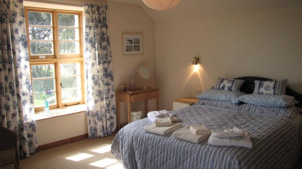 Worswell Barton B&B main bedroom - higher shippen.jpg